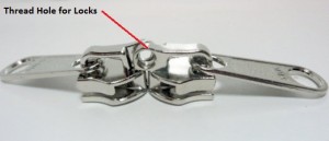thread holes for zipper locks